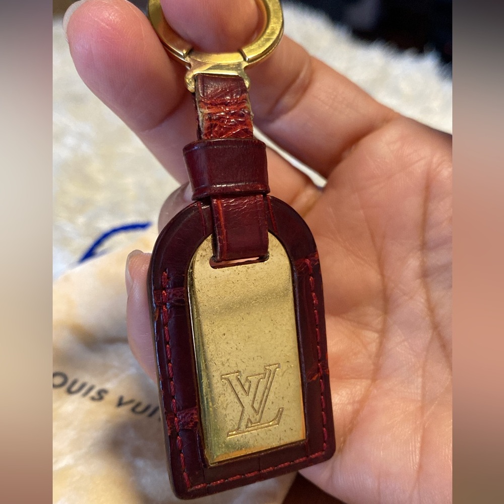 Authentic Louis Vuitton leather charm and key holder
